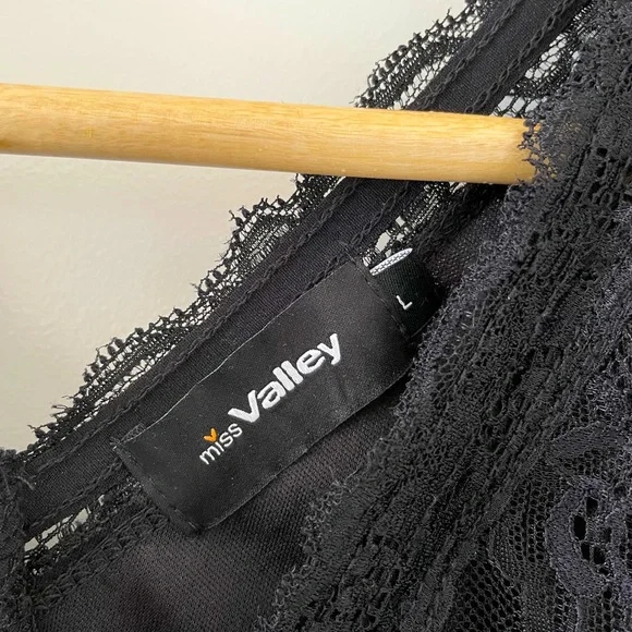 Black stretch lace bodysuit. - Picture 2 of 3